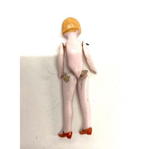 577 - Antique miniature German bisque doll blonde hair jointed doll, approximate height: 8.5cm, chips to t... 