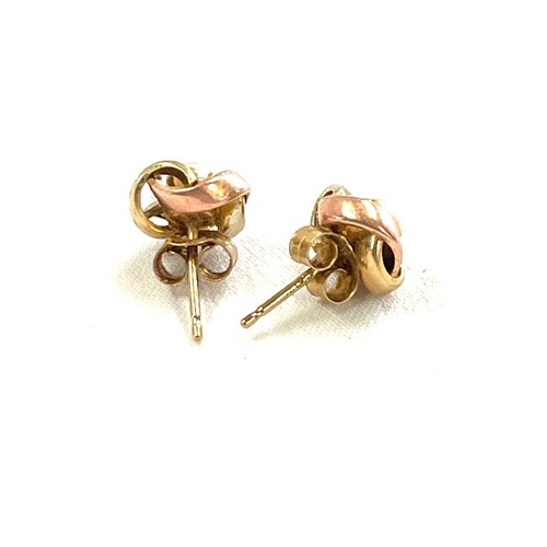 561 - Pair 9ct gold two tone ladies pearl set earrings, knot design.