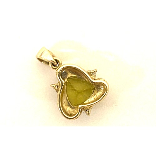 591 - 9k lemon citrine and white topaz y. gold pendant