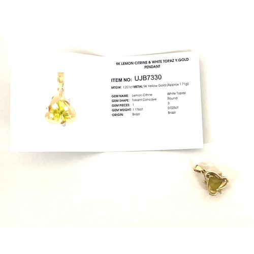 591 - 9k lemon citrine and white topaz y. gold pendant