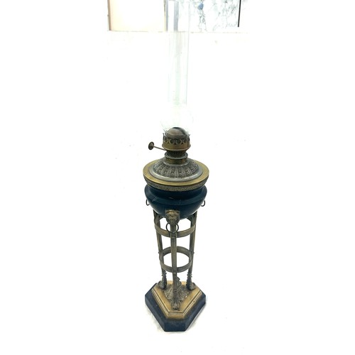 376 - Victorian brass base oil lamp with lion knocker design, with funnel, height approximately