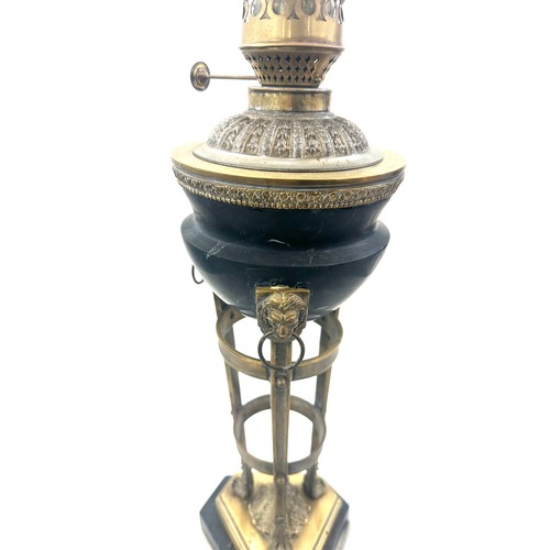 376 - Victorian brass base oil lamp with lion knocker design, with funnel, height approximately