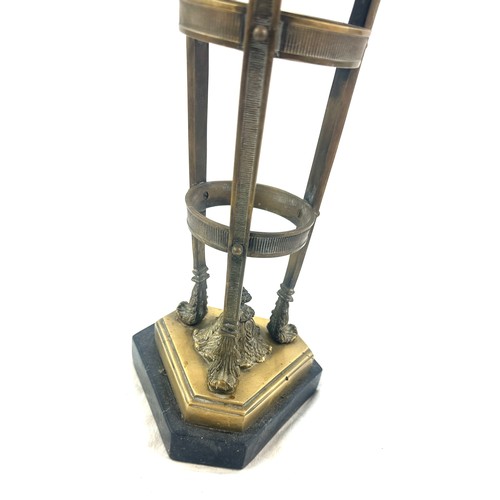 376 - Victorian brass base oil lamp with lion knocker design, with funnel, height approximately