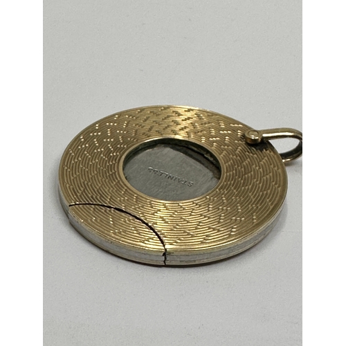 117 - 9ct gold & stainless steel cigar cutter measures approx 3.5 cm dia weight 19.6g