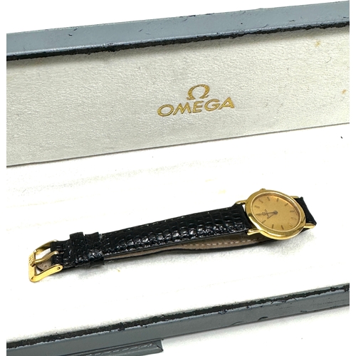 352 - Boxed ladies quartz omega wristwatch the watch is not ticking boxed with booklet etc