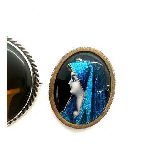 457 - Vintage Limoges enamel type brooch, the back marked PARIS together with a porcelain brooch