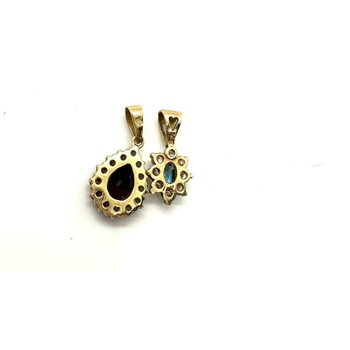 453 - 2, 9ct gold gem set pendants