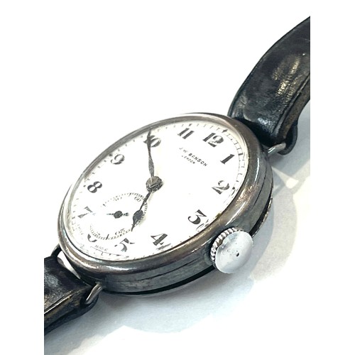 439 - WW1 period Benson military trench watch with a silver case, winds up and ticks