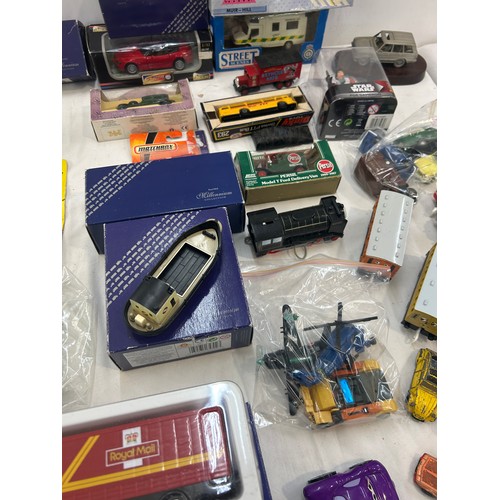 232 - Selection of boxed diecast cars, trains, models etc, to include matchbox, Corgi etc