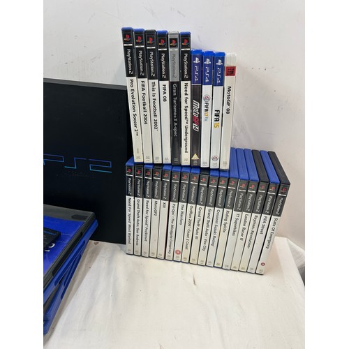 242 - 2 Playstation 2 consoles, no controllers, with leads and memory cards, to include some playstation g... 