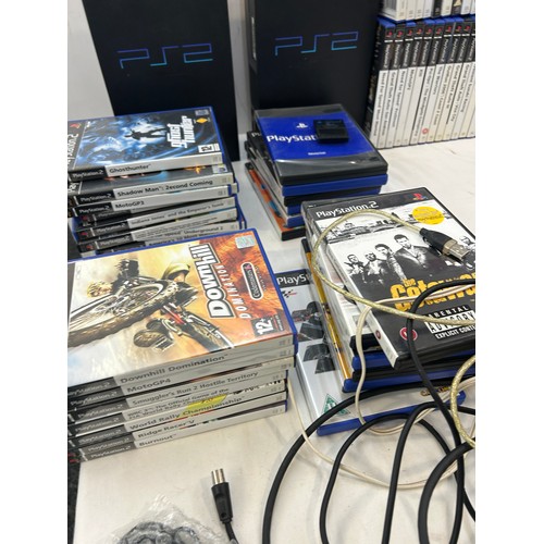 242 - 2 Playstation 2 consoles, no controllers, with leads and memory cards, to include some playstation g... 