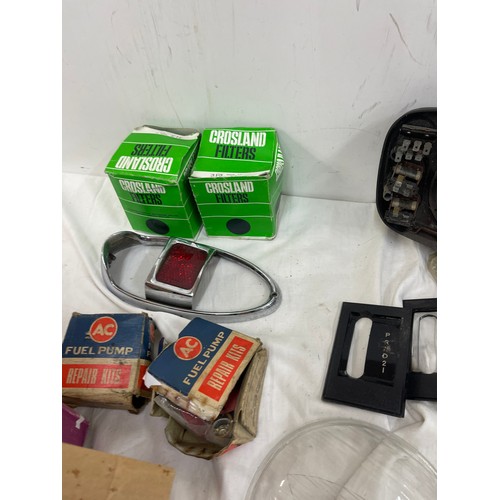 256 - Large selection of vintage car parts includes Fuel pump, crossland filters etc