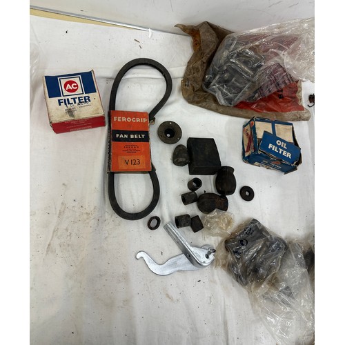 257 - Selection of vintage car parts includes Fan belt, oil filter etc