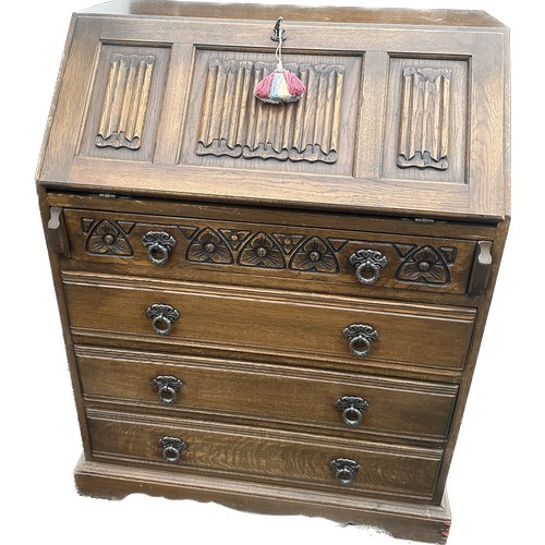 337 - Old charm Oak 4 drawer bureau with panels measures approximately39 inches tall 29 inches wide 19 inc... 