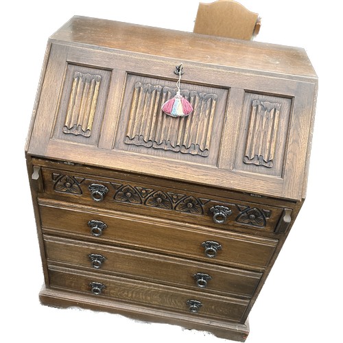 337 - Old charm Oak 4 drawer bureau with panels measures approximately39 inches tall 29 inches wide 19 inc... 