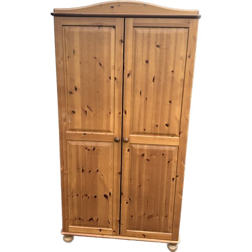 329 - pine 2 door wardrobe measures approximately 71 inches tall