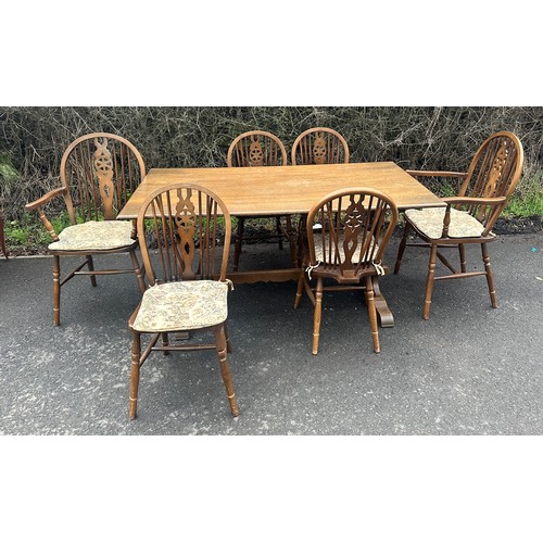 369 - old charm oak rectory table and 6 wheel back chairs including 2 carvers