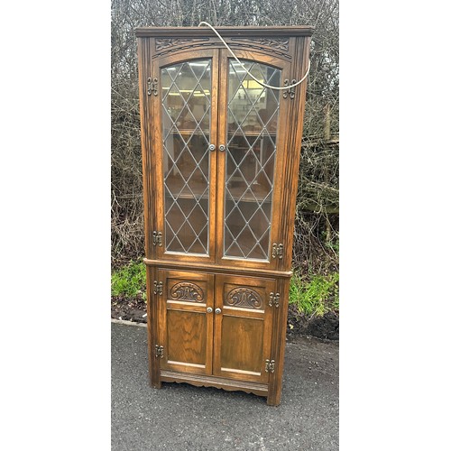 365 - Vintage old charm corner cabinet with lights measures approximately 66 inches tall