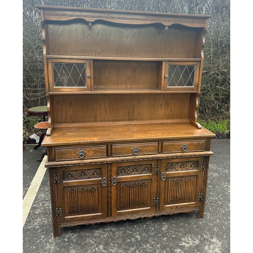 367 - Old charm dresser measures approximately 69 inches tall 53 inches wide 17 inches depth