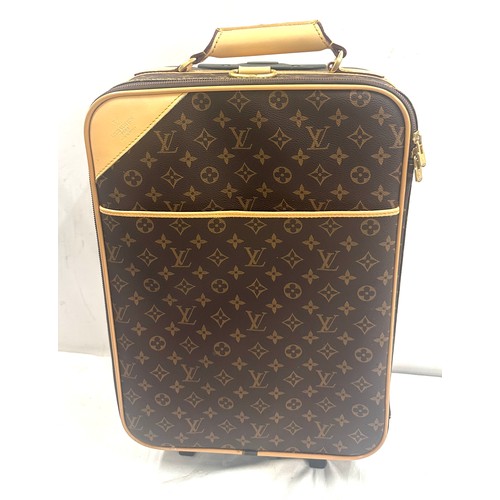 116 - Small luggage case, approximate measurements: Height 23 inches