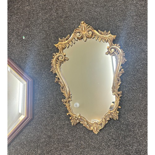 279 - 2 Framed hall mirrors largest measures approximately 29 inches tall 20 inches wide