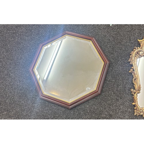 279 - 2 Framed hall mirrors largest measures approximately 29 inches tall 20 inches wide