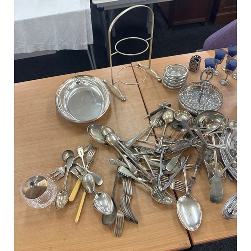 208 - Large selection of silver plated ware includes lighters, cutlery, salt and pepper and a selection of... 