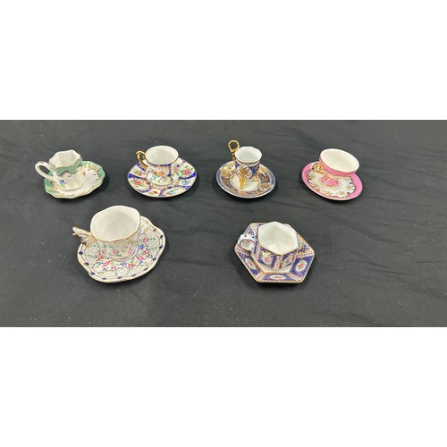 92 - Selection of miniature cups and saucers