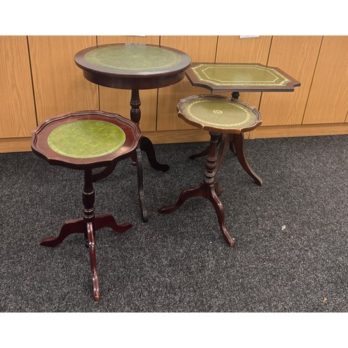 331 - 4 Leather topped wine occasional tables largest measures approximately 18 inches diameter 25 inches ... 