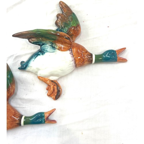 404 - Set of 3 Beswick graduating wall hanging ducks, damage to wing and beak but has been repaired