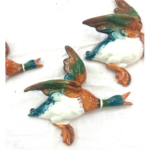 404 - Set of 3 Beswick graduating wall hanging ducks, damage to wing and beak but has been repaired