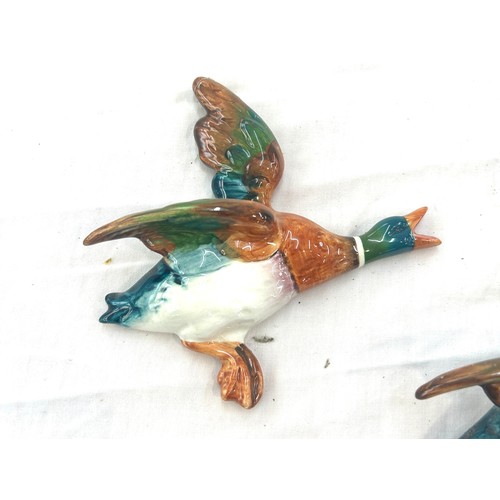 404 - Set of 3 Beswick graduating wall hanging ducks, damage to wing and beak but has been repaired