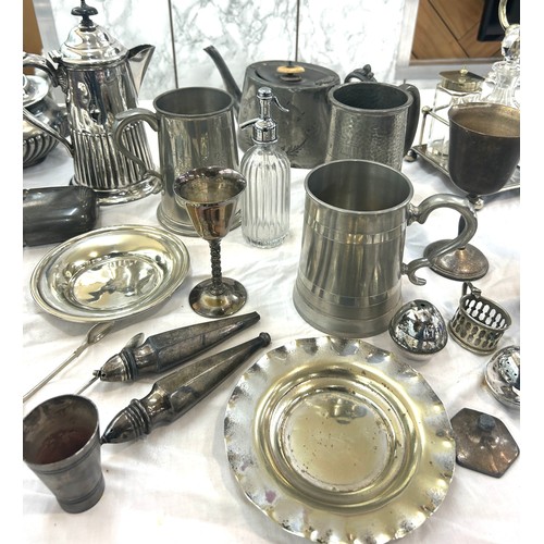 159 - Large selection of metal ware includes tea pots, goblets, cruet set etc