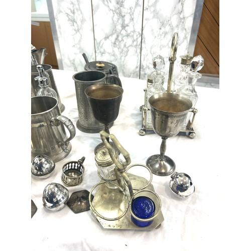 159 - Large selection of metal ware includes tea pots, goblets, cruet set etc