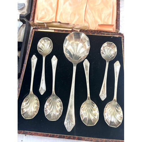 151 - Large selection of cased cutlery sets includes spoons etc