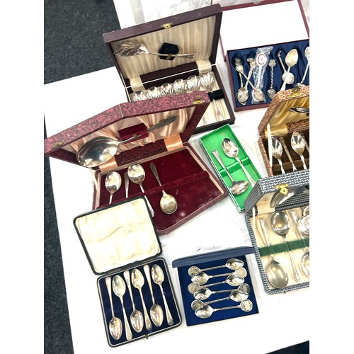 151 - Large selection of cased cutlery sets includes spoons etc