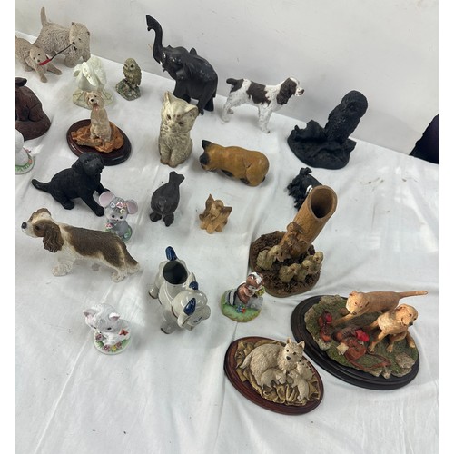 153 - Large selection of animal figures includes cats, dogs etc