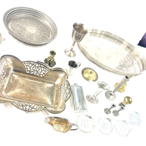 229 - Selection of metal ware includes trays, candle sticks etc