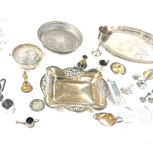 229 - Selection of metal ware includes trays, candle sticks etc