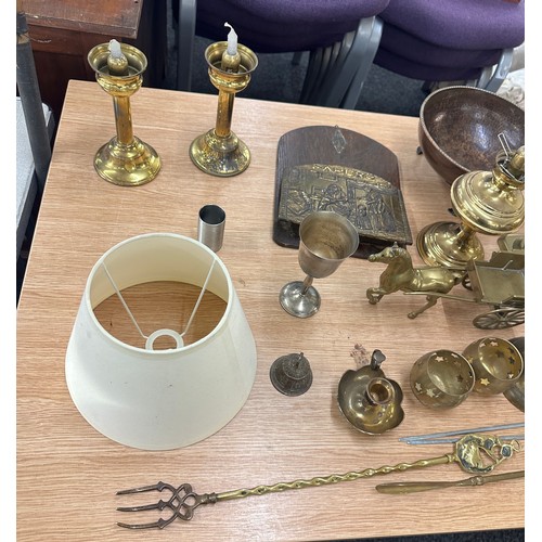 139 - Large selection of assorted brass ware includes bells, candle stick etc