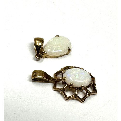 275 - 2 x 9ct gold opal pendants (1.1g)