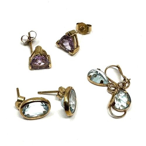 265 - 3 x 9ct gold amethyst & topaz earrings (2.8g)