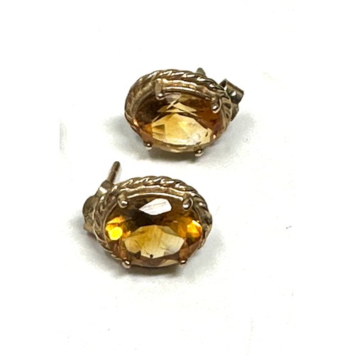 155 - 2x 9ct gold citrine & garnet stud earrings (3.7g)