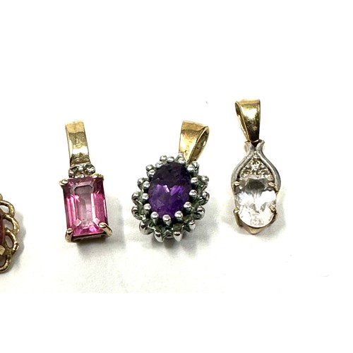 149 - 4x 9ct gold diamond, amethyst, garnet, pink topaz & white gemstone pendant (2.7g)