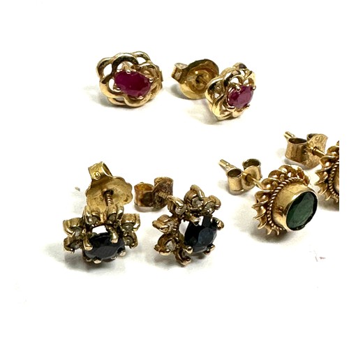 154 - 3x 9ct gold sapphire, ruby, diamond and green gemstone stud earrings (3.7g)