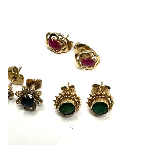 154 - 3x 9ct gold sapphire, ruby, diamond and green gemstone stud earrings (3.7g)