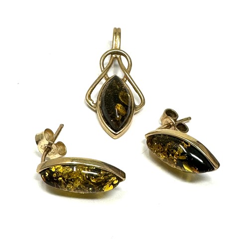 203 - 9ct gold amber pendant & earrings set (3g)