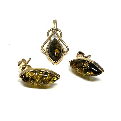 203 - 9ct gold amber pendant & earrings set (3g)