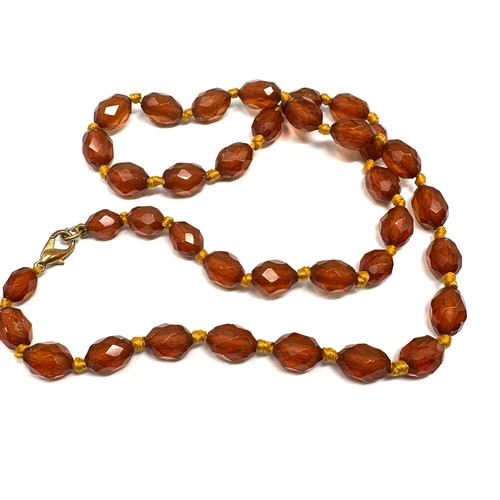 478 - Antique Amber necklace individually knotted (19g)