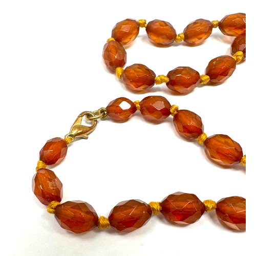 478 - Antique Amber necklace individually knotted (19g)